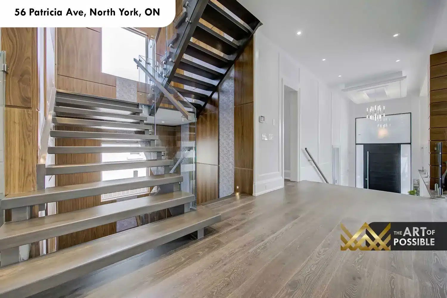 Open-tread staircase with glass railings at 56 Patricia Ave
