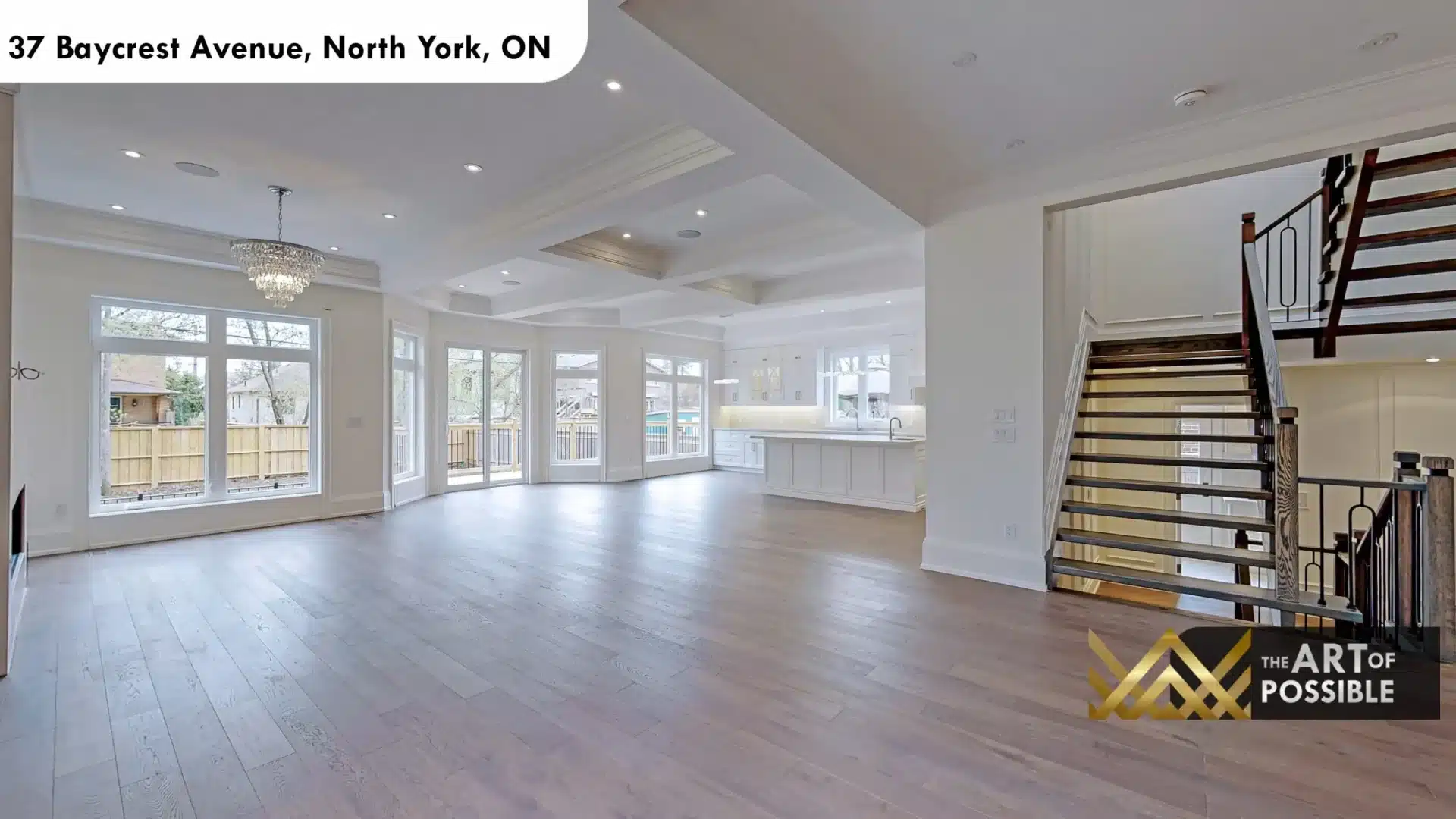 37 Baycrest Ave main floor open plan staircase black iron balusters open tread kitchen visible