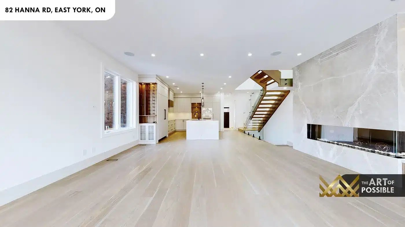 Full-height book-matched marble slab fireplace wall at 82 Hanna Rd