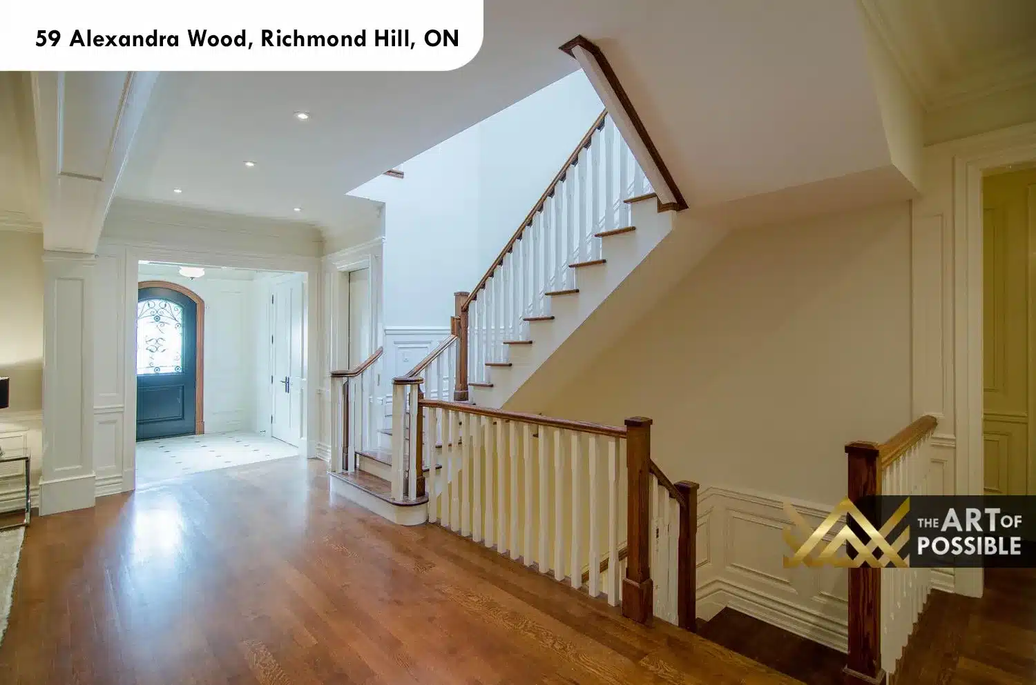 59 Alexandra Wood North York oak staircase white balusters foyer wainscoting
