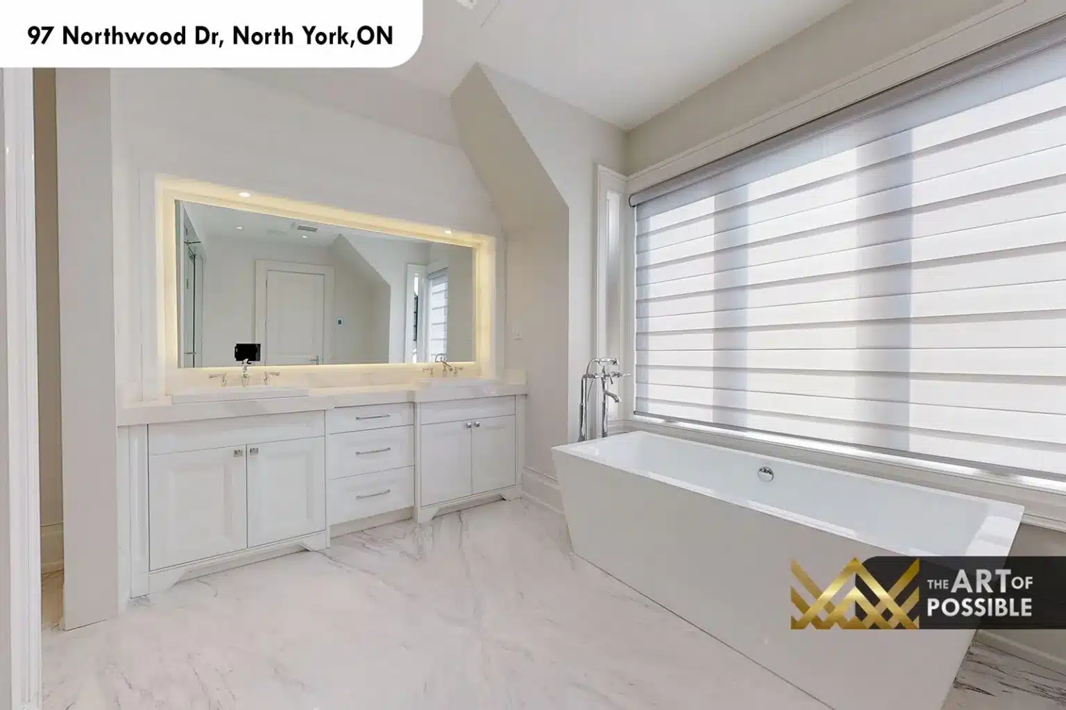 97 Northwood Dr primary ensuite freestanding soaker tub double vanity backlit LED mirror white marble