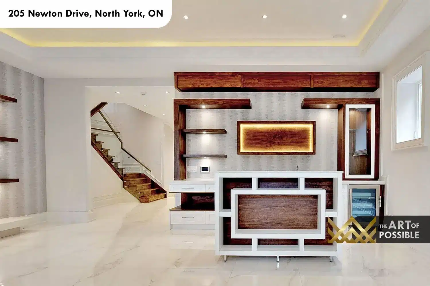 205 Newton Drive lower level wet bar walnut cabinetry LED shelving wine fridge