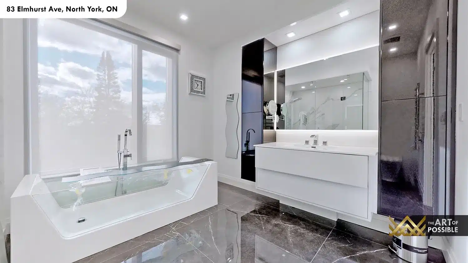 83 Elmhurst Ave North York primary ensuite glass soaker tub backlit mirror dark marble floor