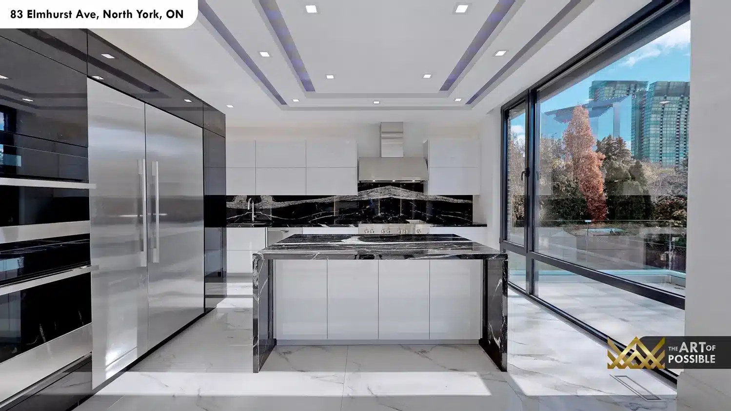 83 Elmhurst Ave North York kitchen marble backsplash island sliding glass doors yard view