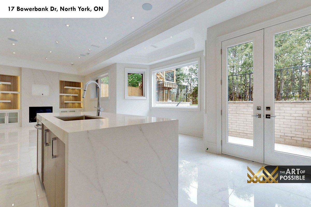 Lower level kitchen with walkout French doors to rear patio