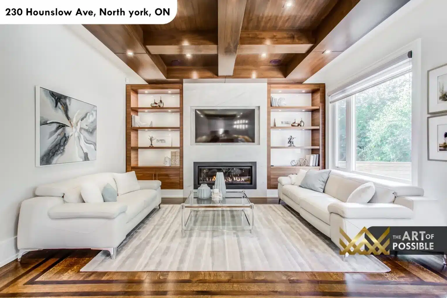 Family room at 230 Hounslow Ave with walnut coffered ceiling, built-in shelving and linear fireplace