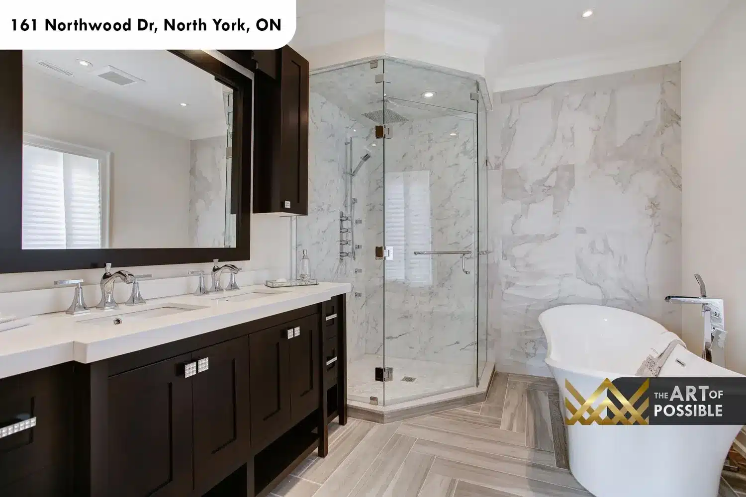 161 Northwood Dr North York primary ensuite full height marble walls freestanding soaker tub double vanity chrome faucets