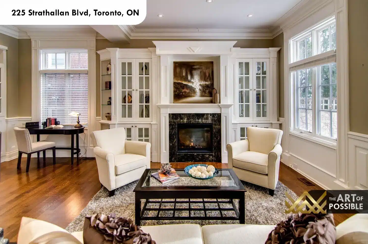 225 Strathallan Blvd Toronto - Family room with dark marble fireplace and built-in cabinetry