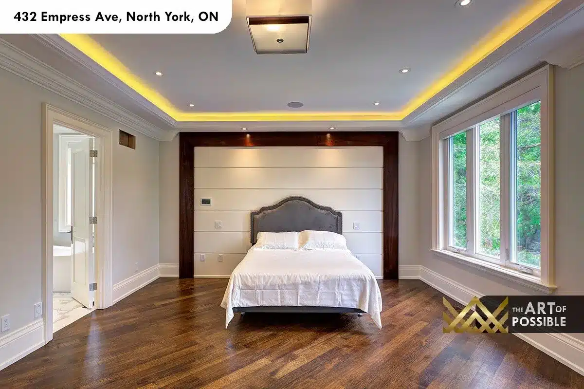 432 Empress Ave - primary bedroom with walnut headboard panel and tray ceiling
