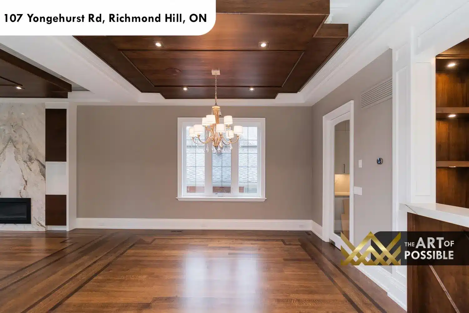 Dining room with dark walnut coffered ceiling and gold crystal chandelier