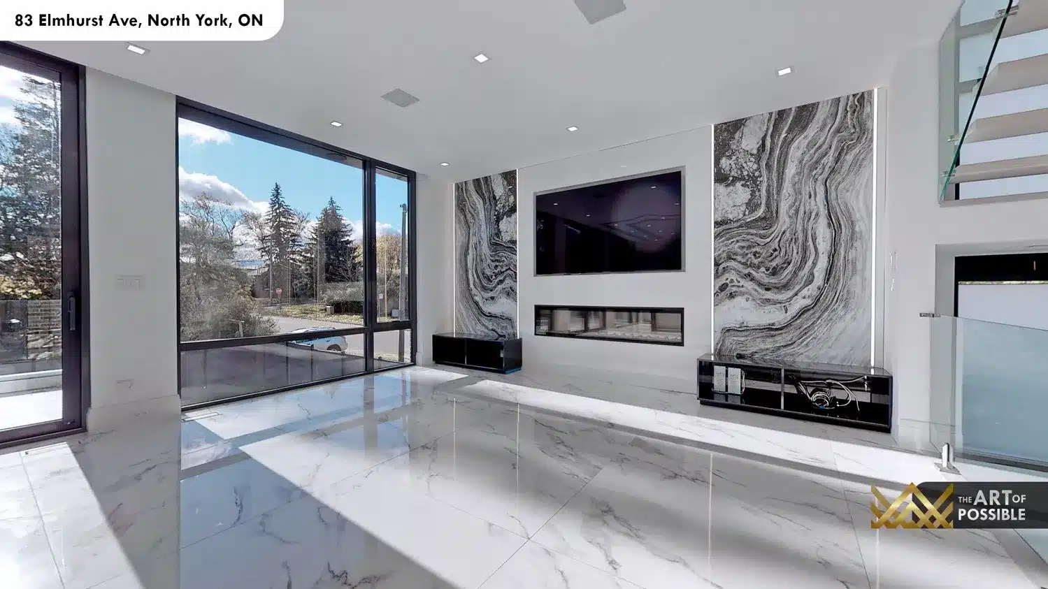 83 Elmhurst Ave North York family room twin backlit marble slabs linear fireplace TV