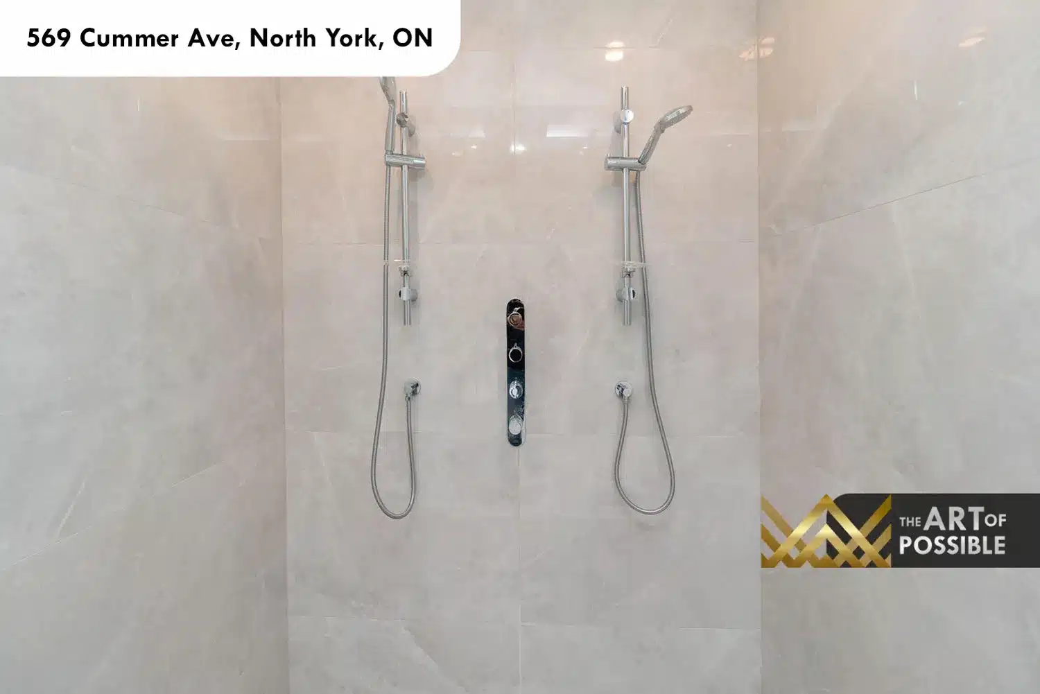 569 Cummer Ave primary ensuite dual handheld shower heads chrome rails large format tile