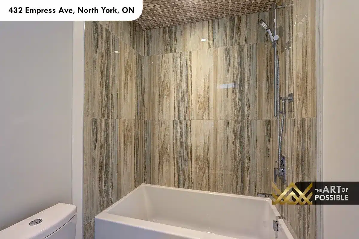 432 Empress Ave - secondary ensuite with travertine-style tile tub surround