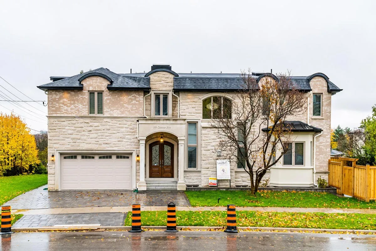 569 Cummer Ave, North York: Stone Facade, Soaring Glass Foyer and a Two-Tone Kitchen with Sculptural Pendant Lighting