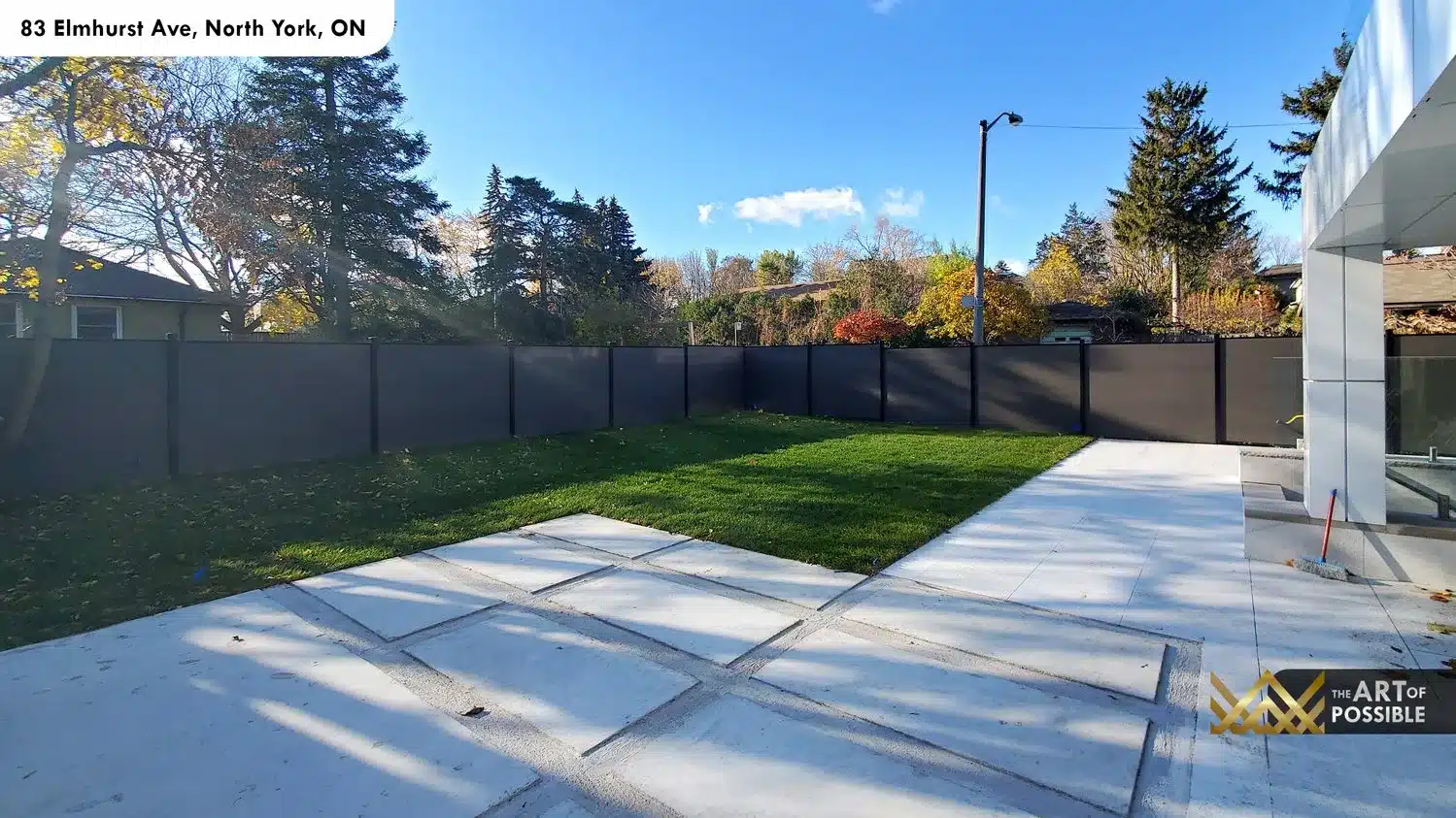 83 Elmhurst Ave North York rear yard patio privacy fence green lawn