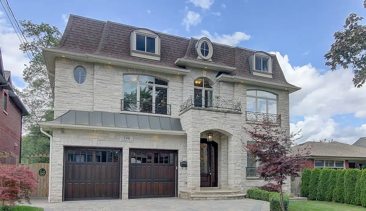 146 Northwood Dr, North York: A Mansard-Roofed Chateau with a Sculptural Curved Staircase and a Walkout Second Kitchen