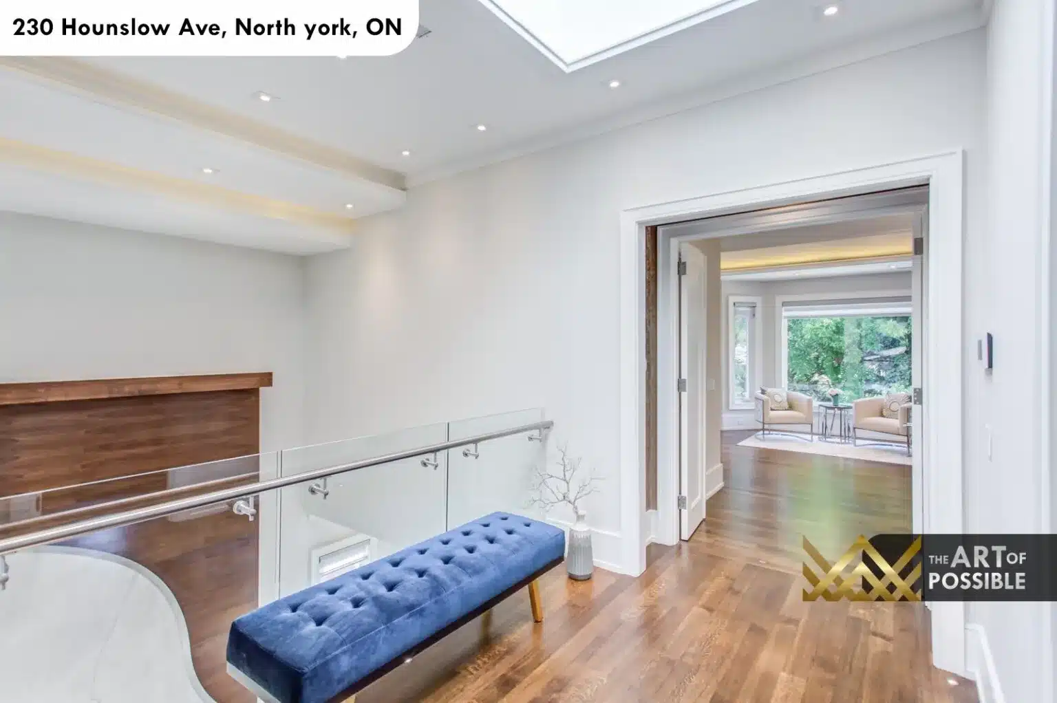 Upper landing at 230 Hounslow Ave with skylight and glass railings
