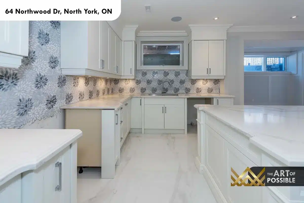Second kitchen detail with botanical mosaic tile and stone countertop