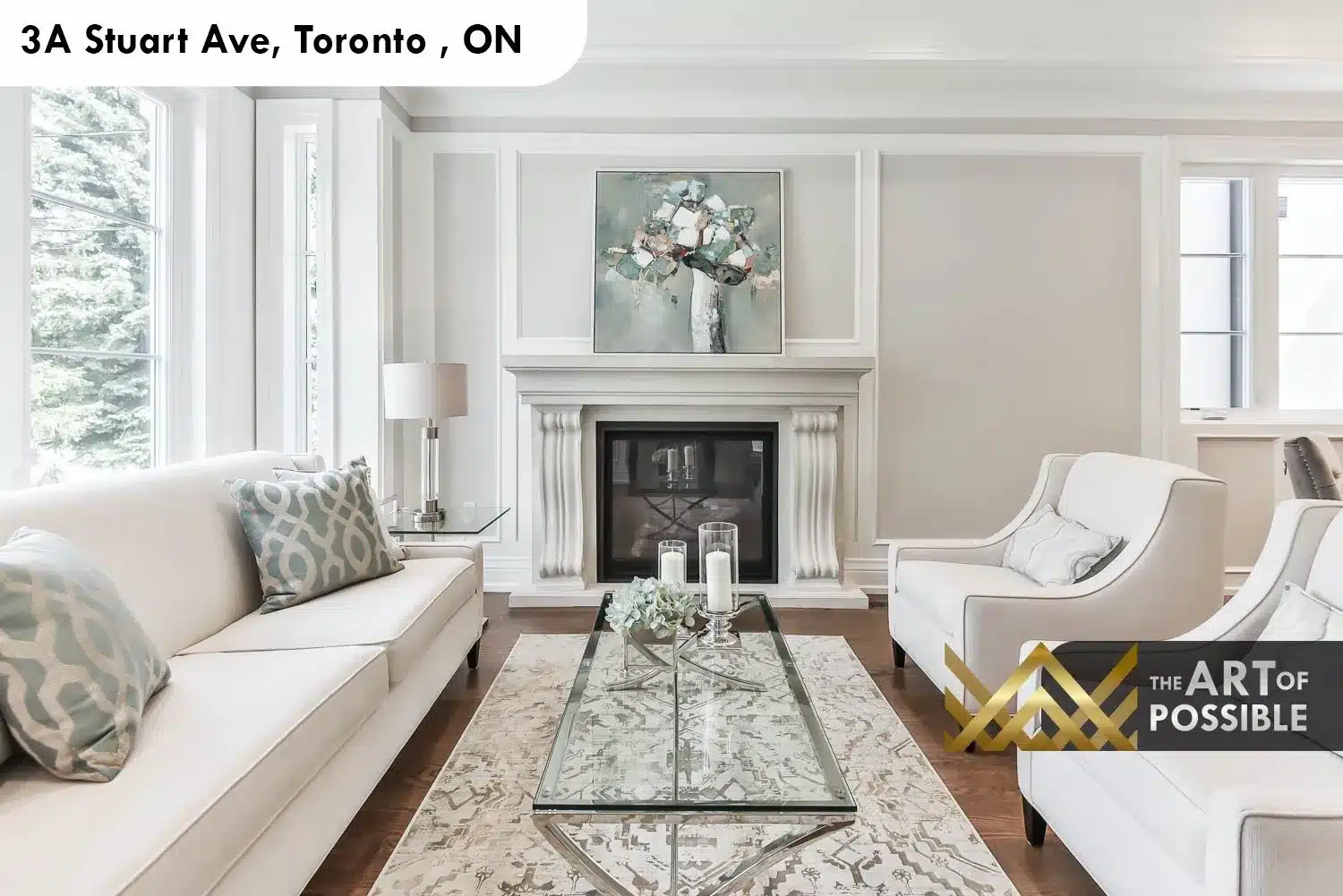 Formal living room at 3A Stuart Ave with white plaster fireplace, tray ceiling and wainscoting