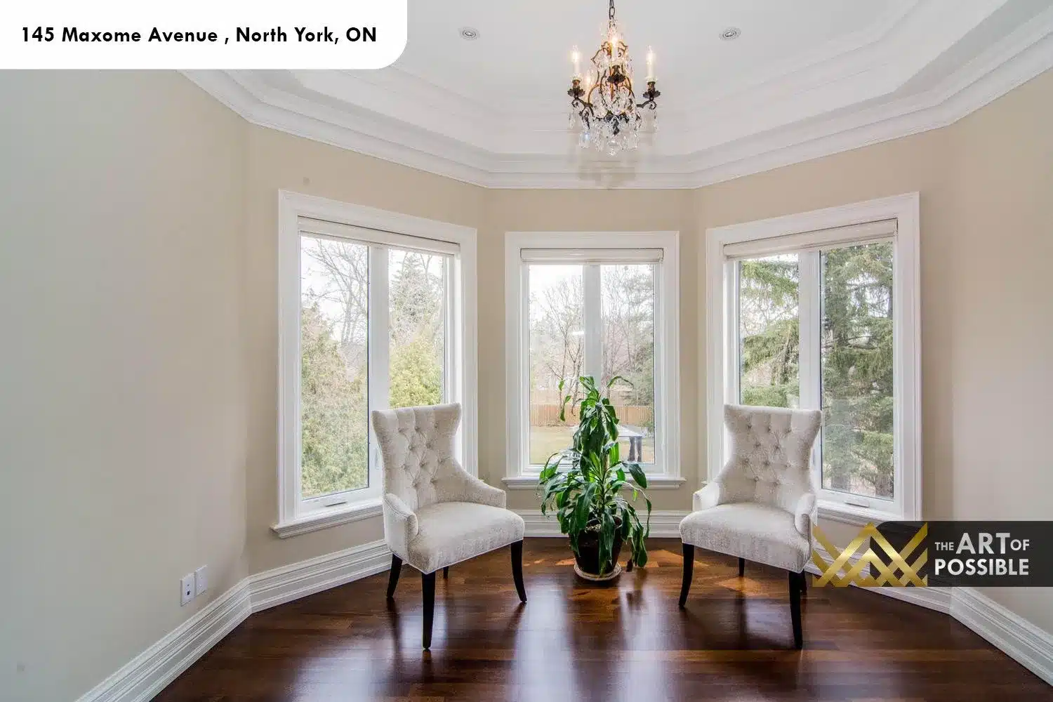 145 Maxome Avenue primary bedroom bay window sitting area garden views crystal chandelier