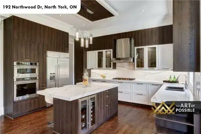 Two-tone kitchen with marble slab backsplash and island, 192 Northwood Dr