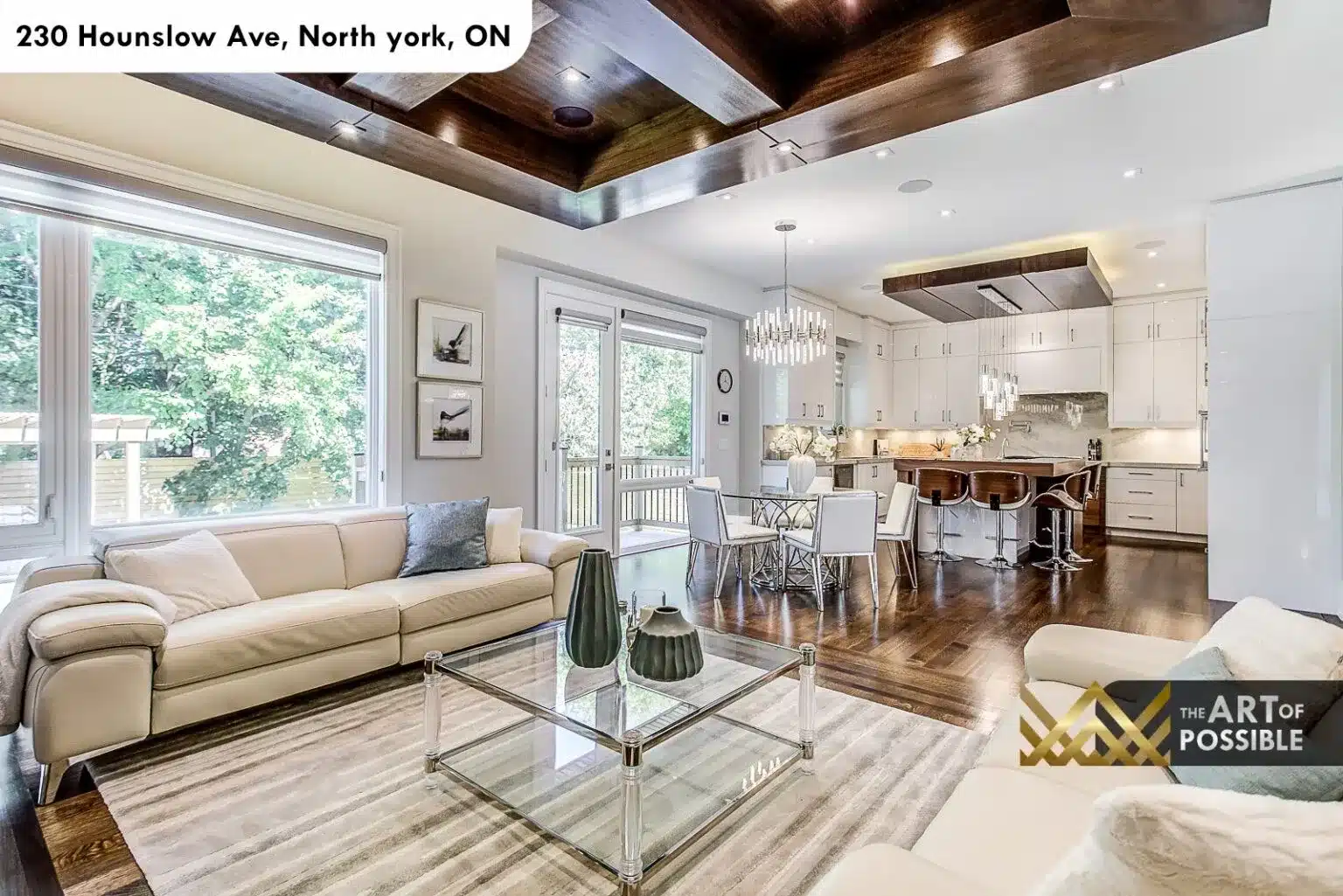 Open family room looking toward kitchen at 230 Hounslow Ave