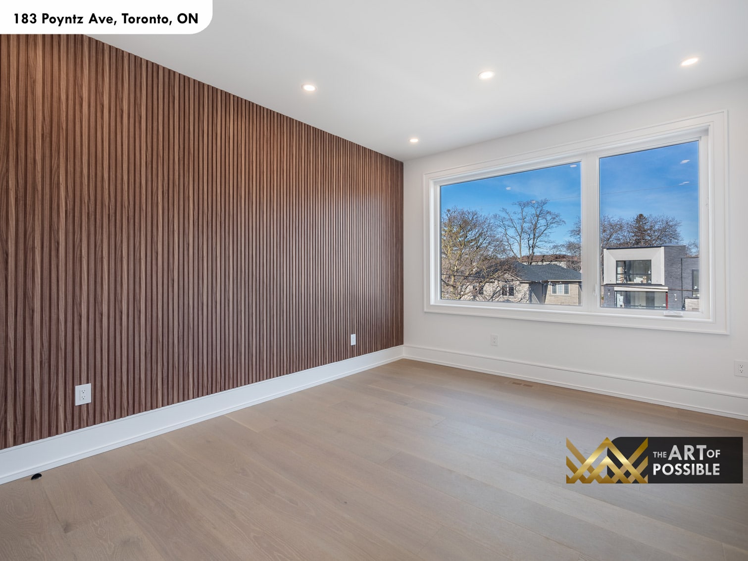 183 Poyntz Ave North York secondary bedroom with walnut slatted feature wall and large picture window
