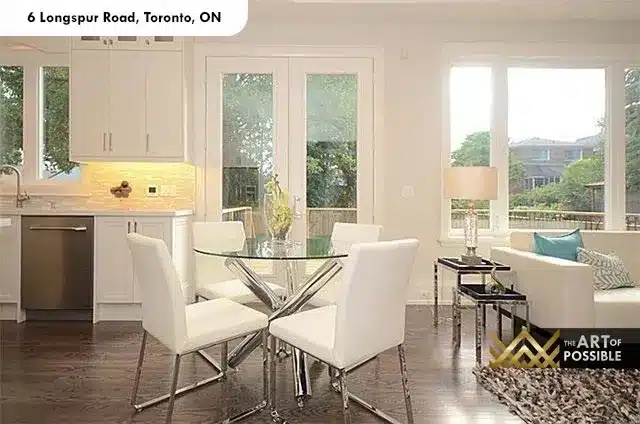 Dining area with glass round table and French door walkout at 6 Longspur Road Toronto
