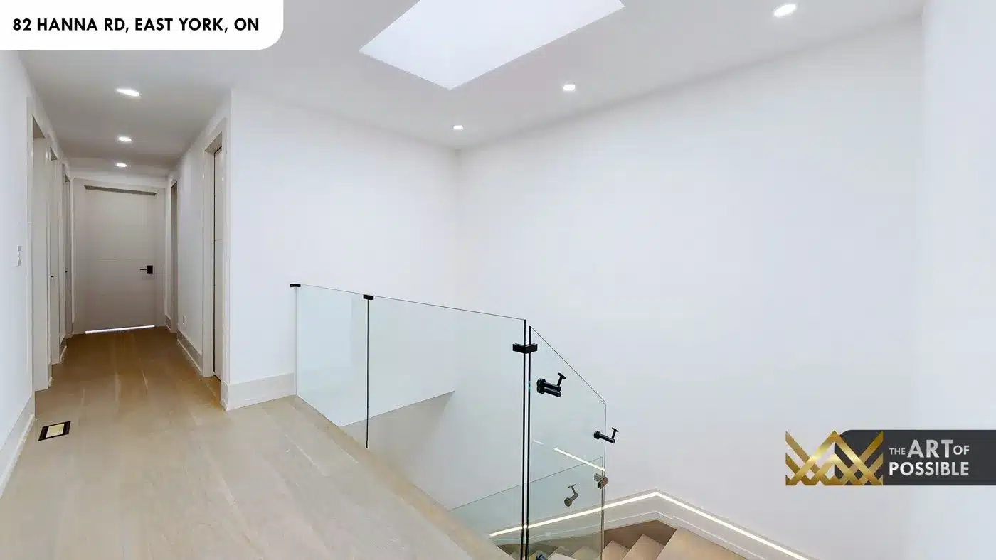 Upper floor hallway with skylight above the staircase landing at 82 Hanna Rd