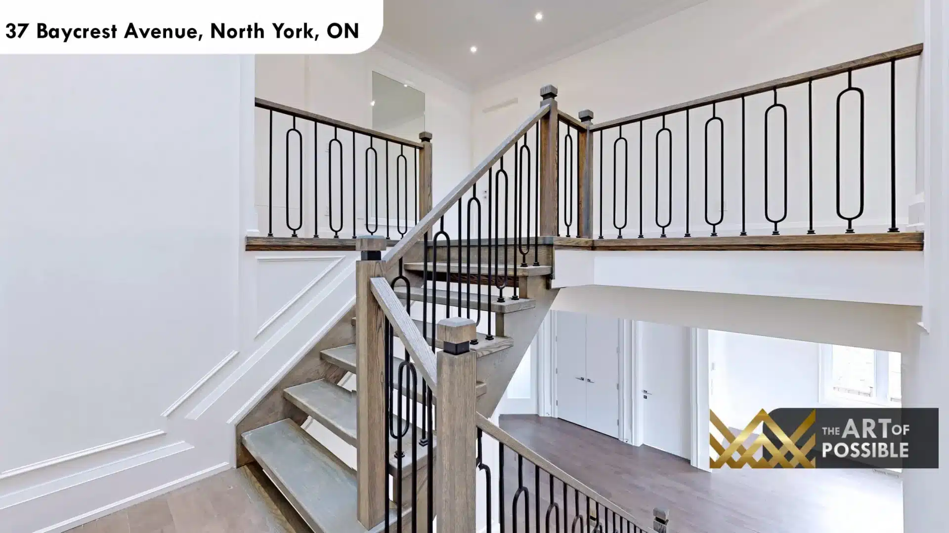 37 Baycrest Ave staircase black iron balusters oak handrail second floor landing upper hall