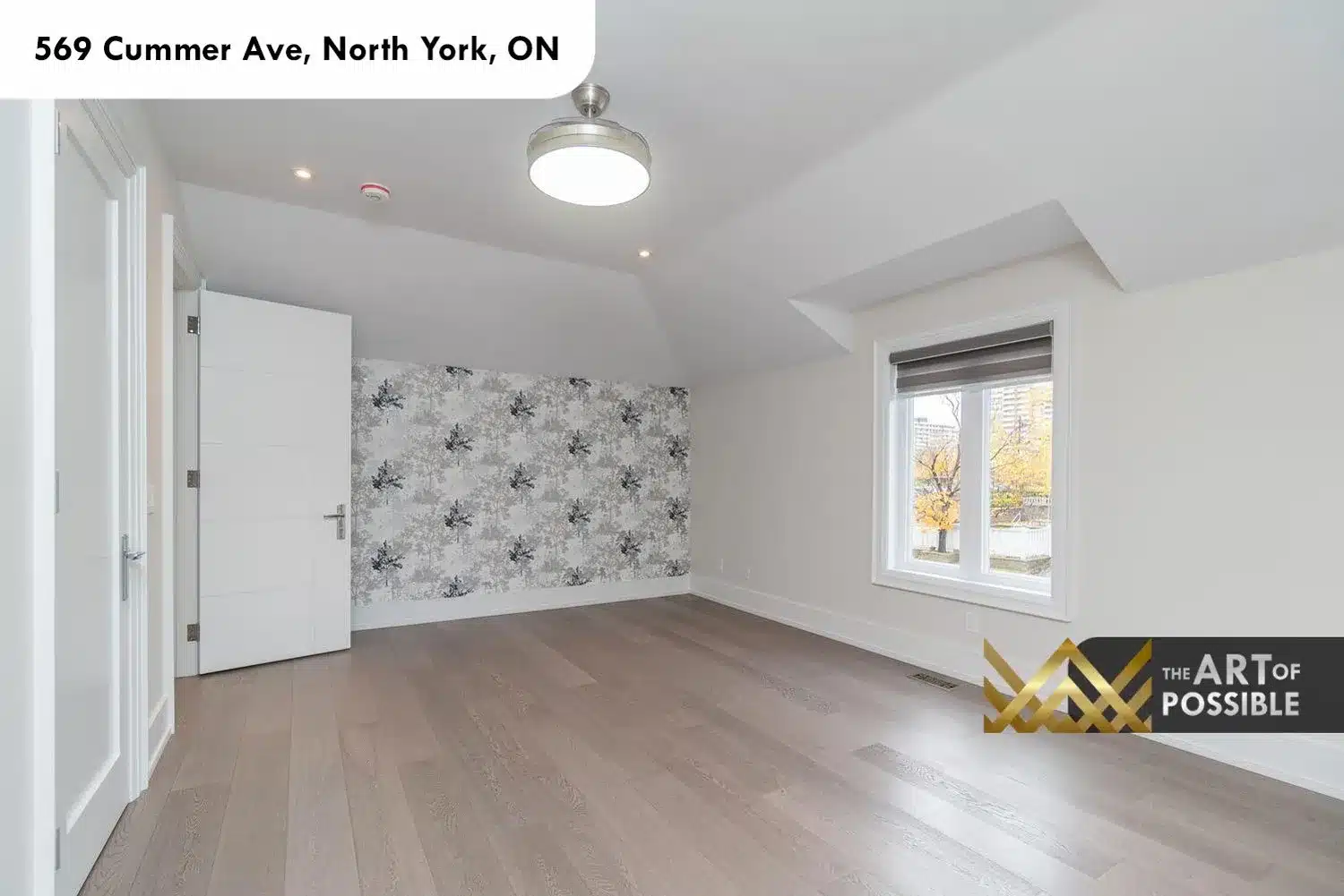 569 Cummer Ave secondary bedroom grey botanical wallpaper accent wall tray ceiling hardwood floors