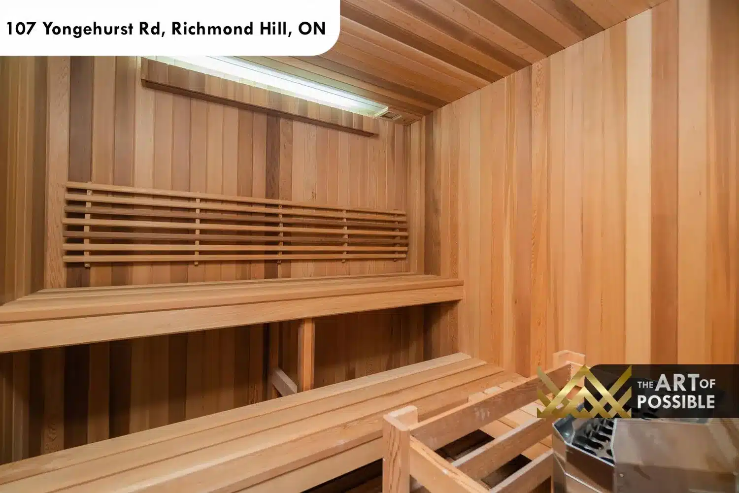 Cedar sauna with tiered bench seating and electric sauna heater