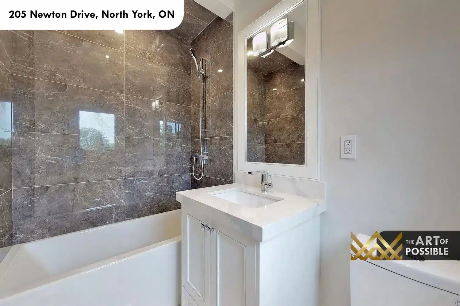 205 Newton Drive secondary bathroom dark marble slab shower surround