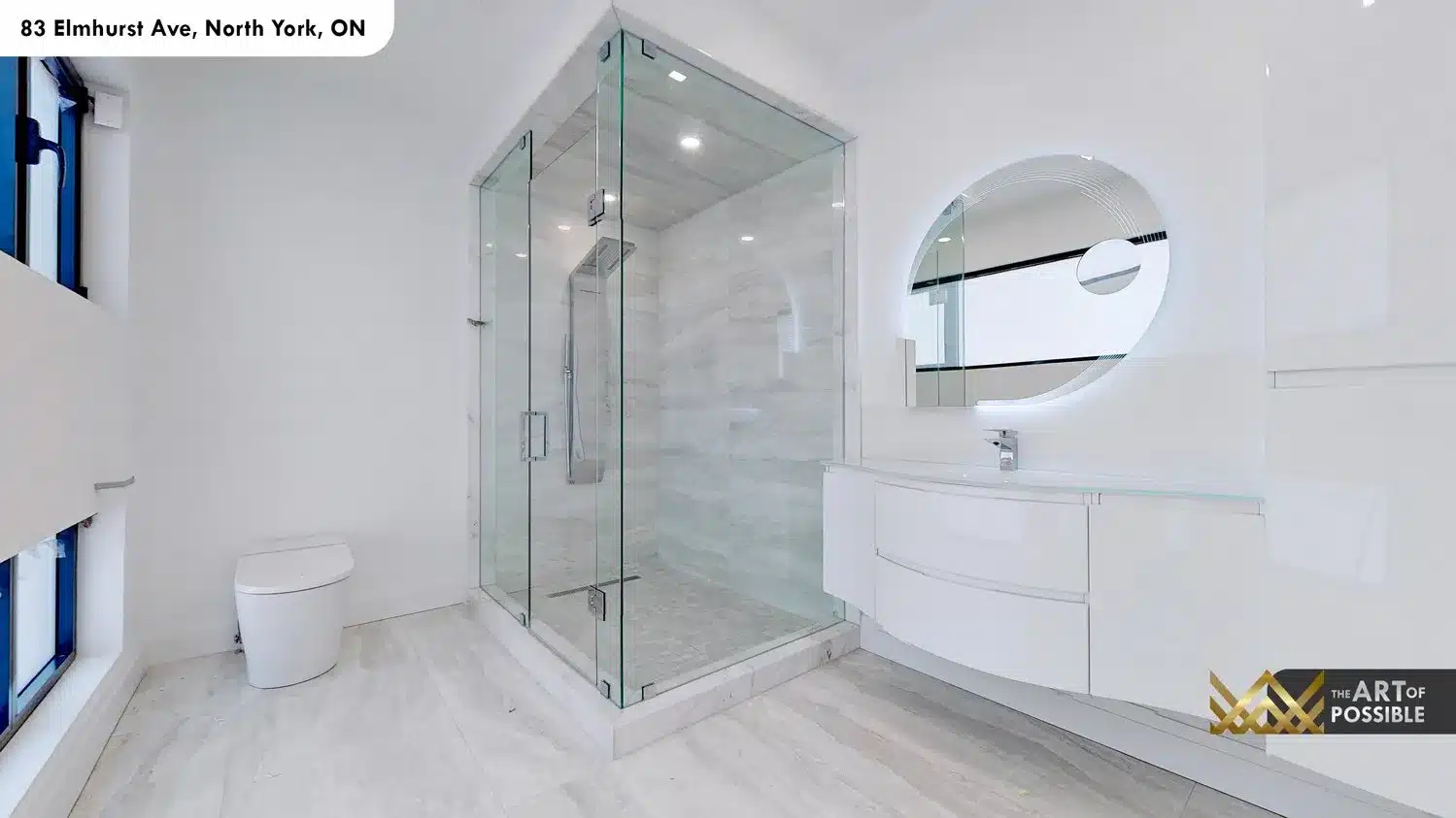 83 Elmhurst Ave North York secondary bathroom curved vanity round backlit mirror glass shower