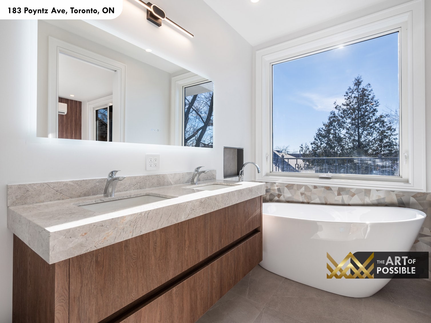183 Poyntz Ave North York primary ensuite soaker tub detail with diamond mosaic tile wall chrome floor-mount faucet and picture window