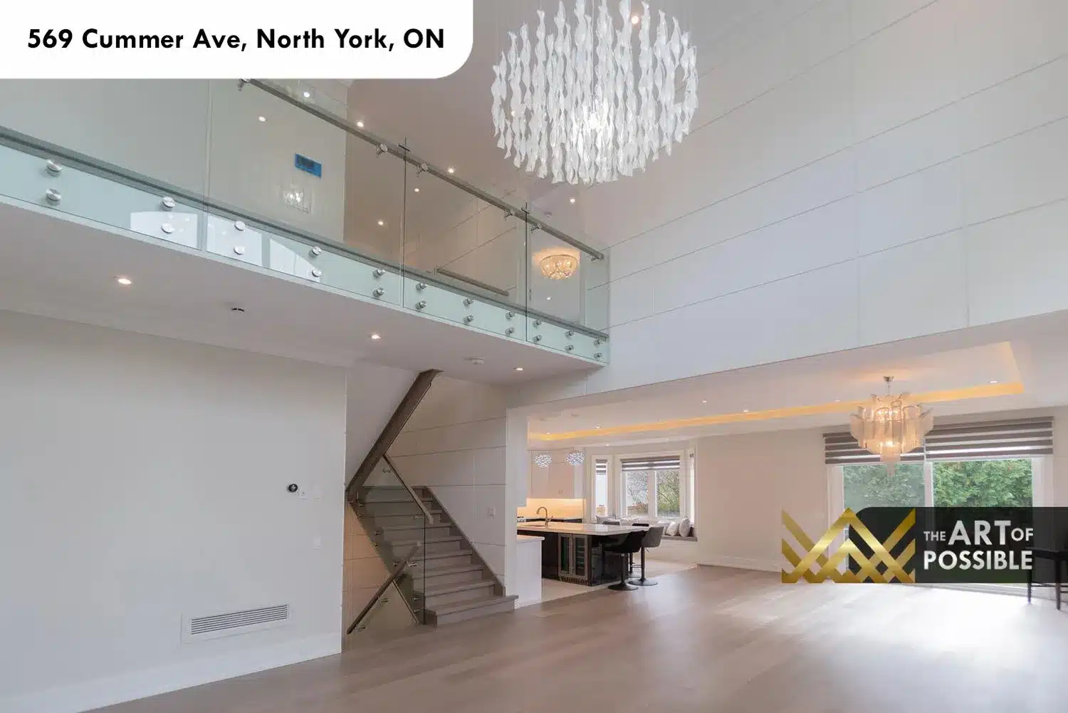 569 Cummer Ave open plan main floor staircase dining kitchen living room view