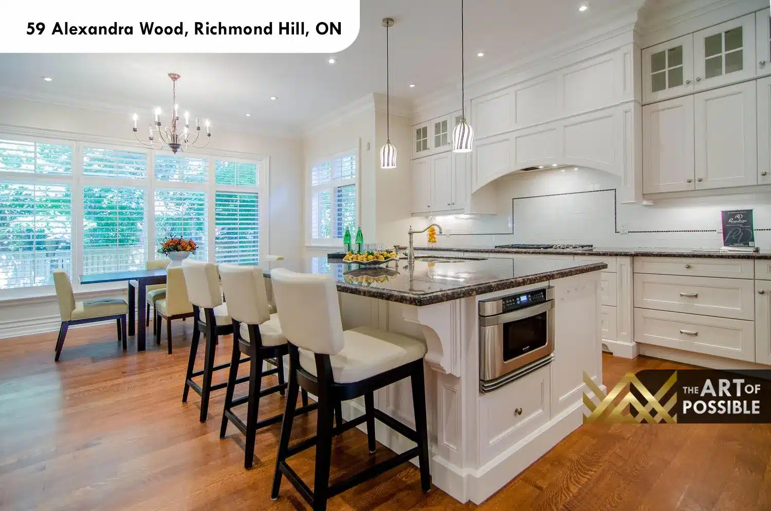 59 Alexandra Wood North York kitchen white shaker cabinetry dark granite island striped glass pendants