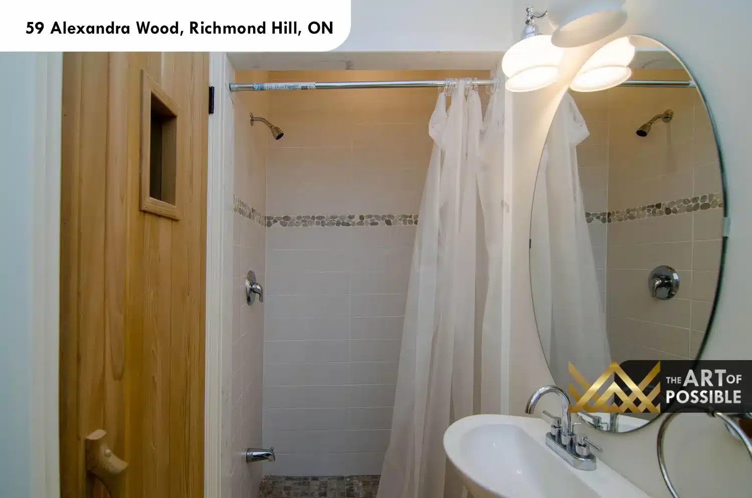 59 Alexandra Wood North York lower level bathroom near sauna oval mirror chrome fixtures white tile