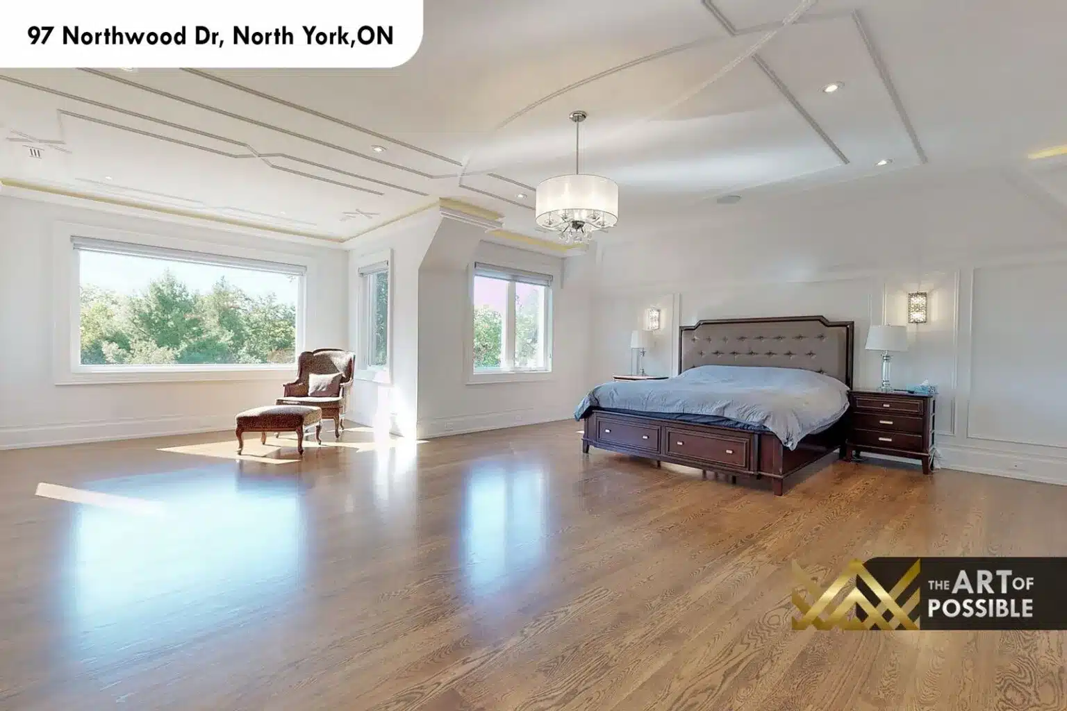 97 Northwood Dr primary bedroom vaulted ceiling hardwood floors picture windows