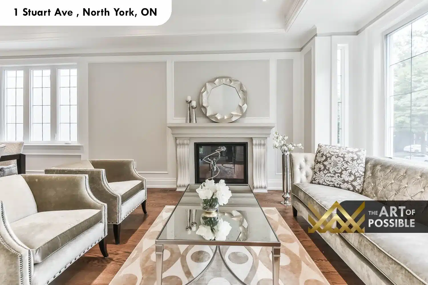 1 Stuart Ave living room bay windows white fireplace surround