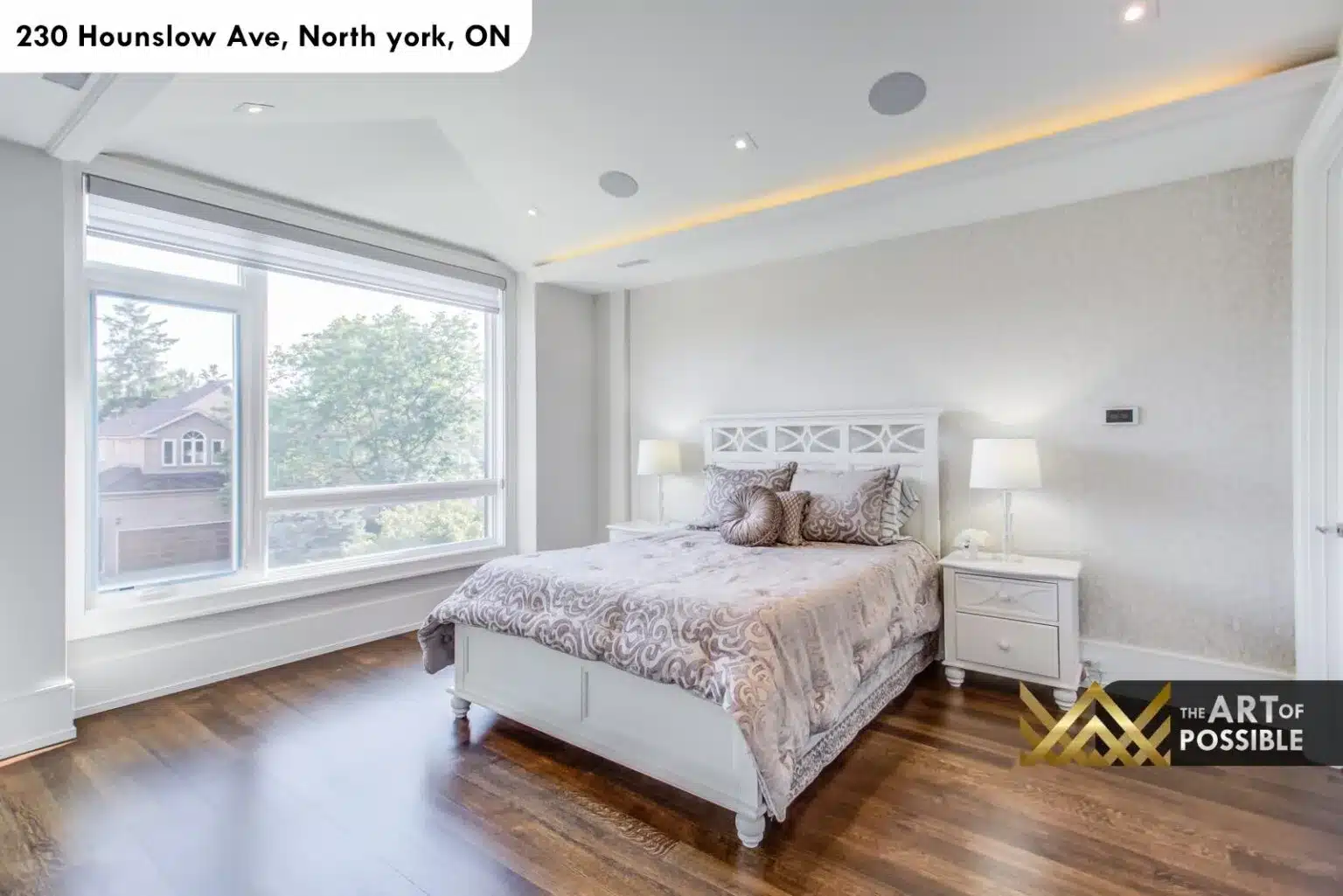 Third secondary bedroom with white furniture and bay picture window
