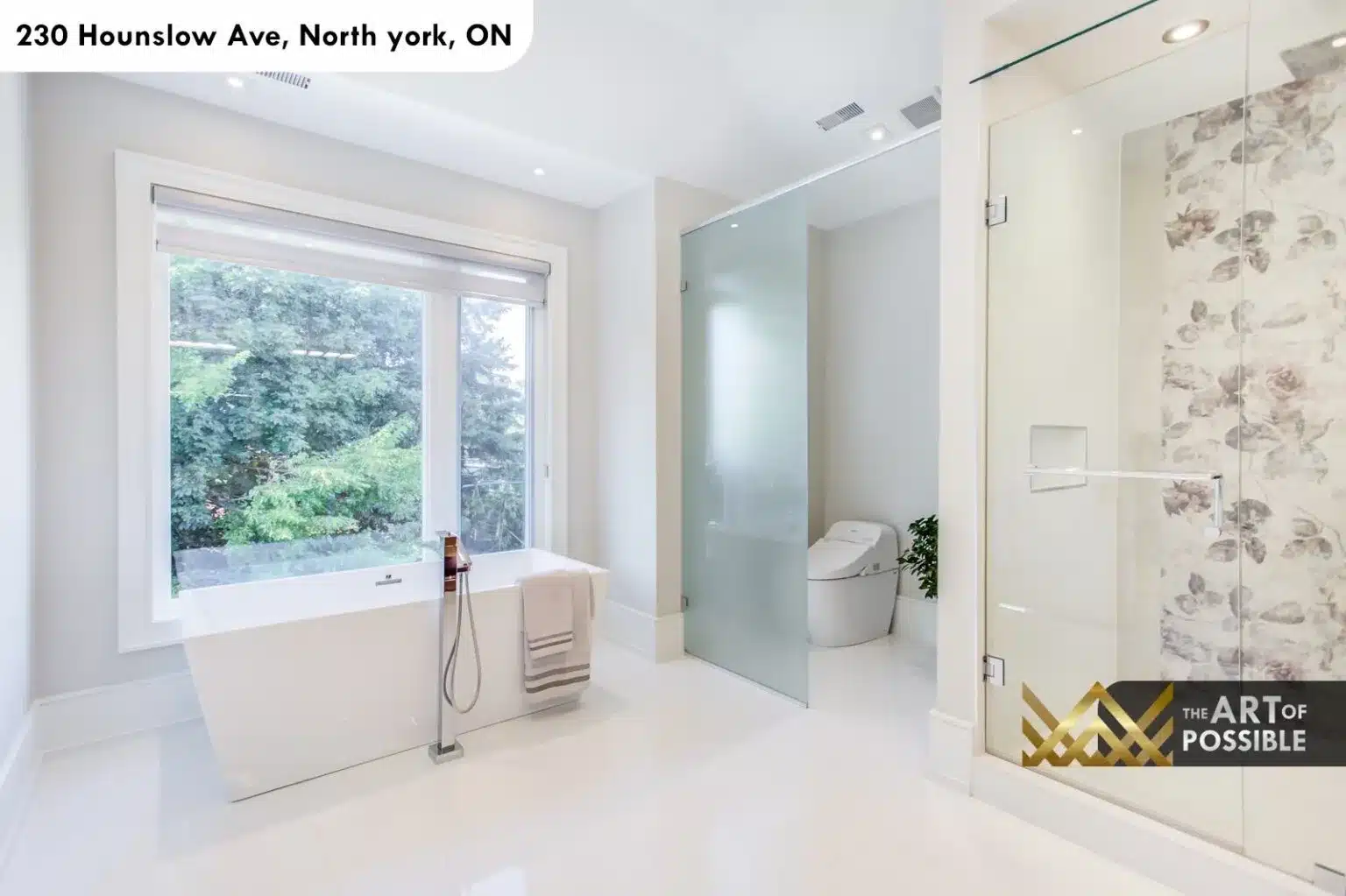 Primary ensuite at 230 Hounslow Ave with freestanding tub, floral tile shower and frosted glass