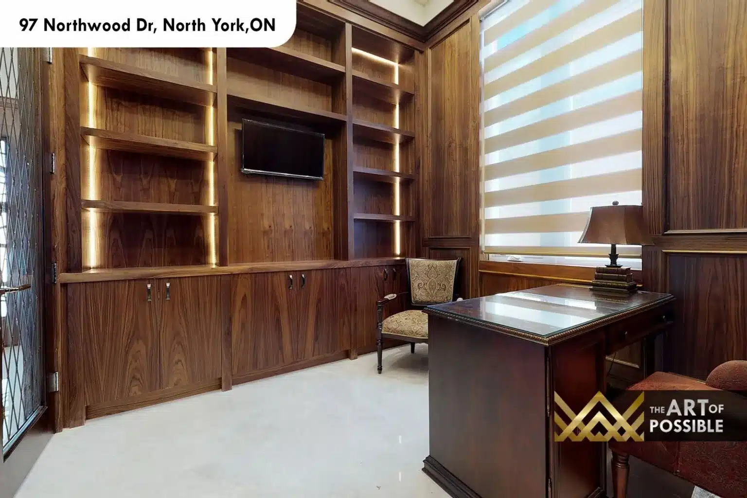 97 Northwood Dr home office walnut panelled walls built-in shelving LED skylight