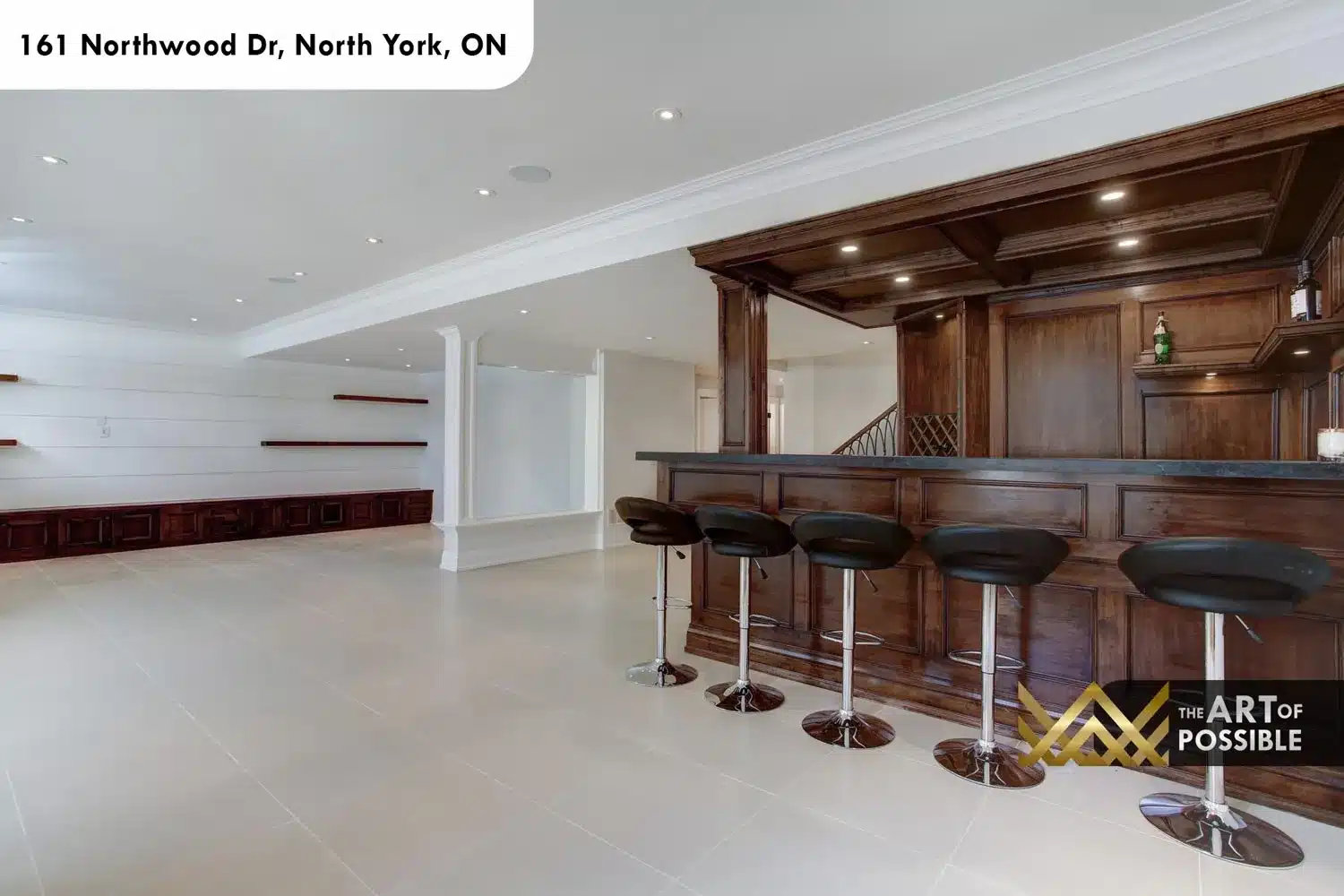 161 Northwood Dr North York basement wet bar dark walnut wine rack black granite countertop bar stools