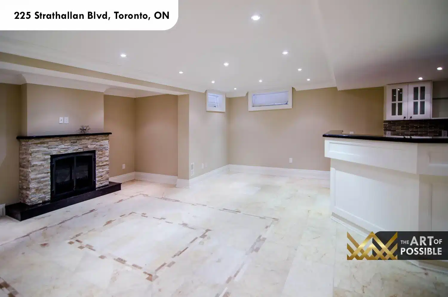 225 Strathallan Blvd Toronto - Basement recreation room with stacked stone fireplace