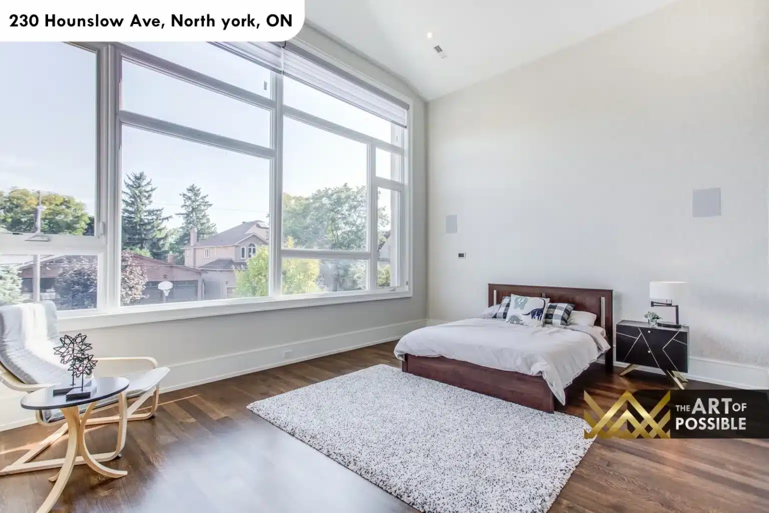 Secondary bedroom with floor-to-ceiling casement windows