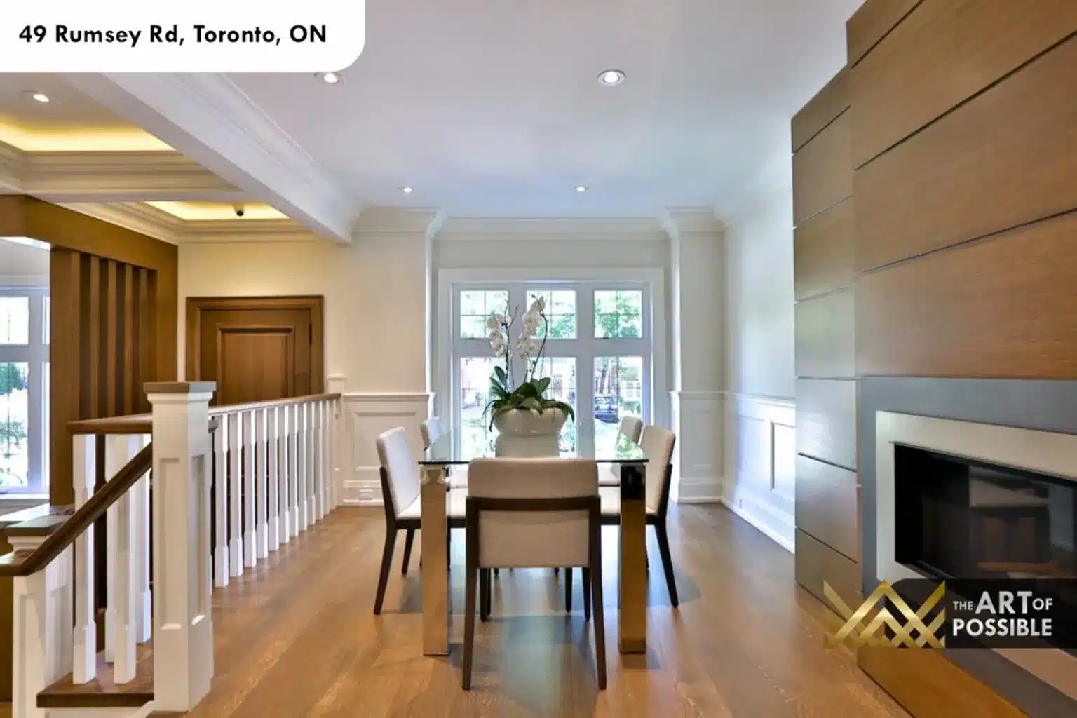 49 Rumsey Rd dining area linear fireplace wood slat surround French doors rear garden