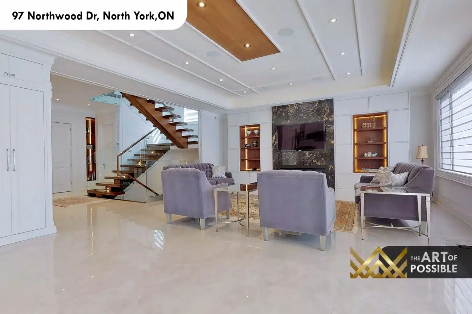 97 Northwood Dr open concept family room kitchen glass staircase marble fireplace