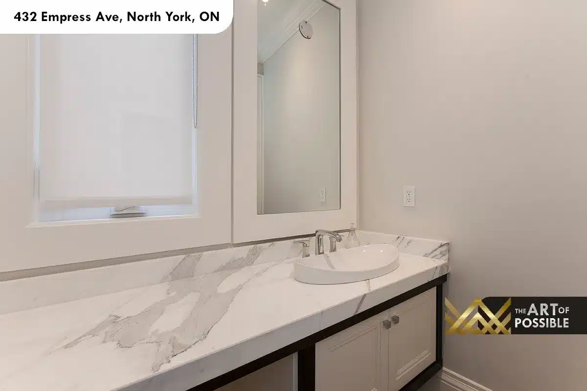 432 Empress Ave - powder room with marble slab vanity and dark walnut base