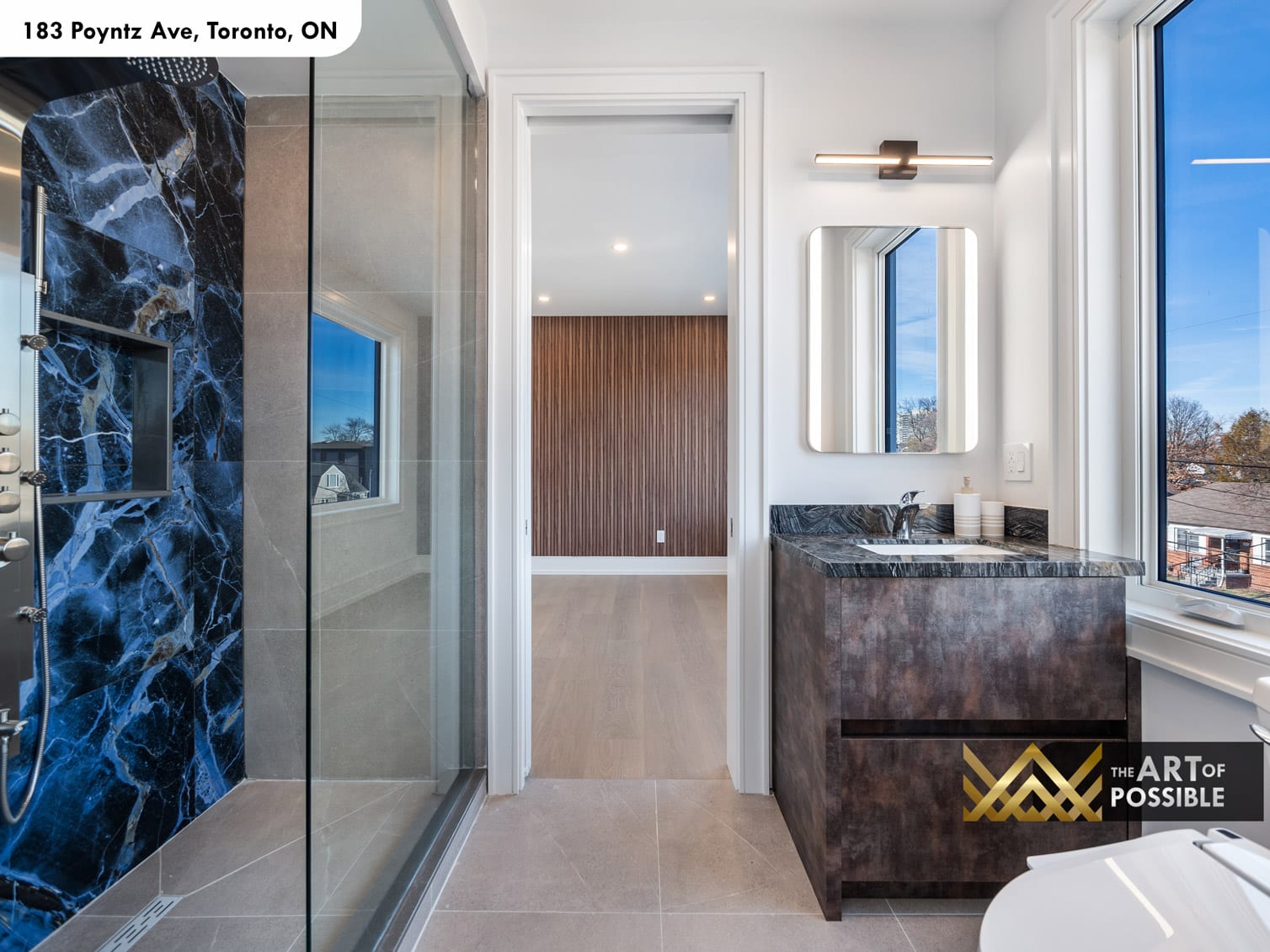 183 Poyntz Ave North York secondary ensuite with navy blue marble shower surround dark vanity and LED backlit mirror